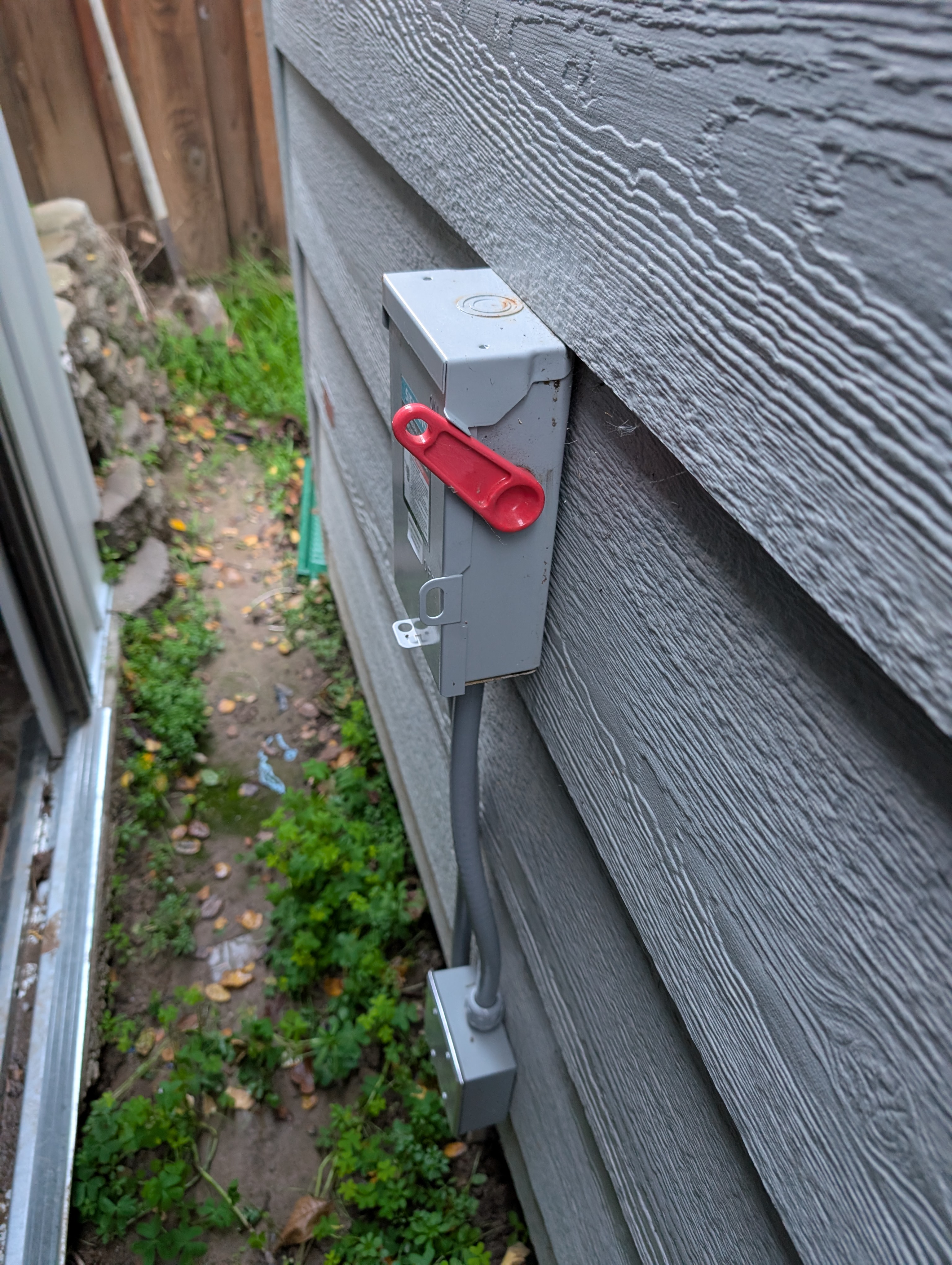 The water heater access panel was left open, indicating the compartment was not properly secured or maintained.