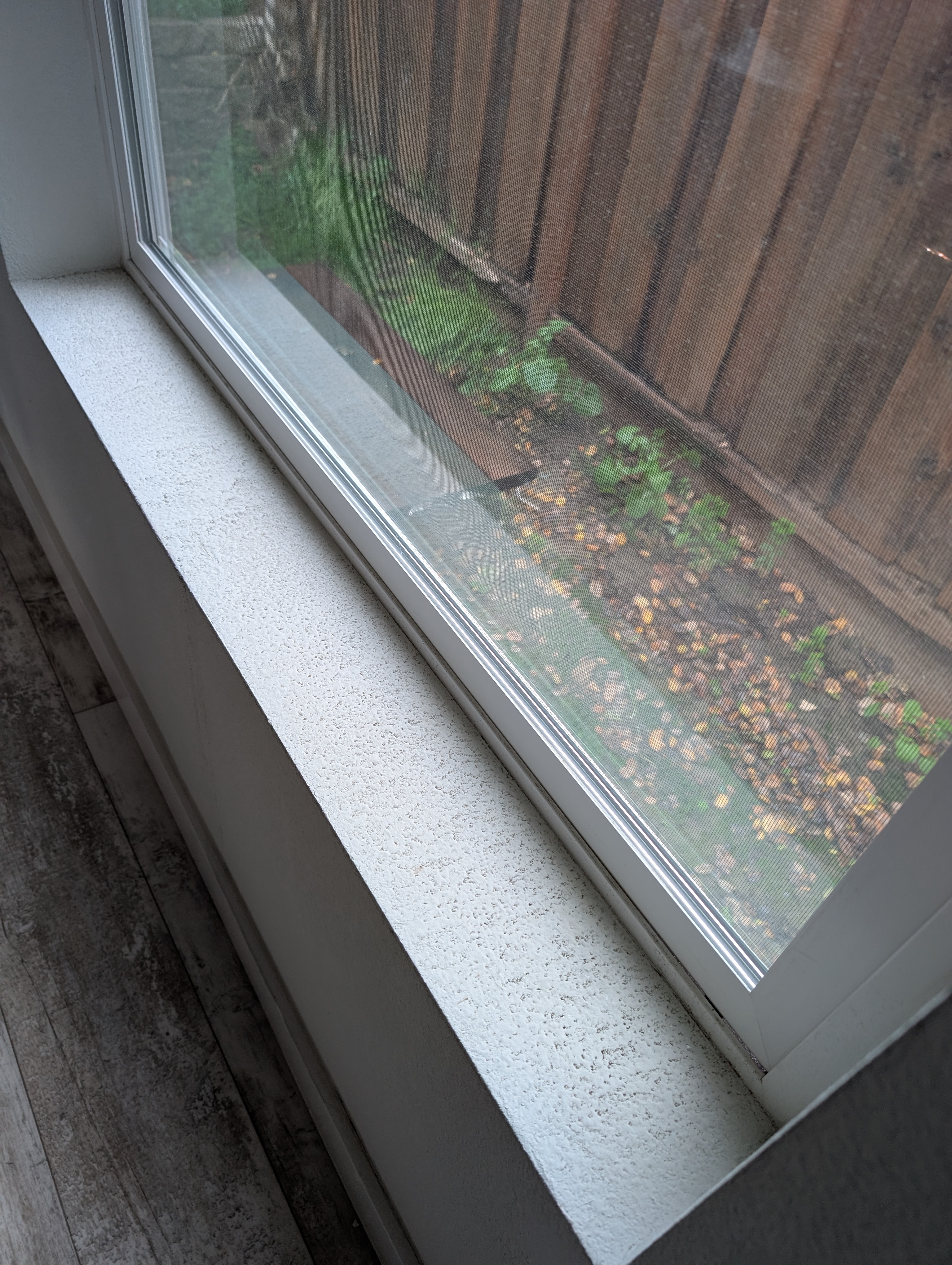 Floor showing water damage and discoloration