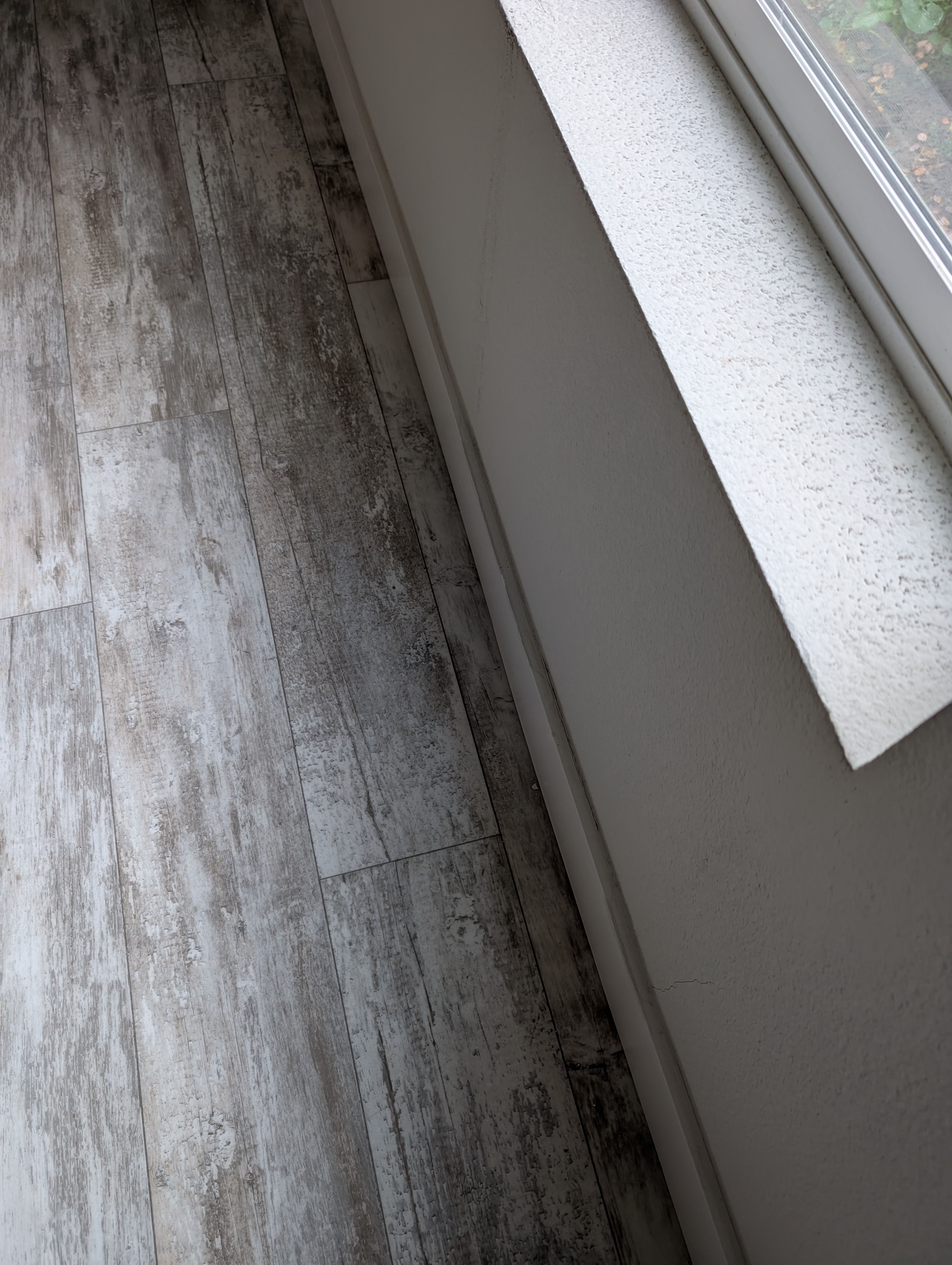 Extent of water damage in master bedroom (night photo)